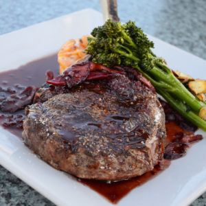 close-up photo of cooked food on square white plate
