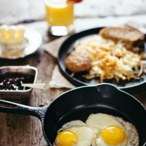 two fried eggs on skillet